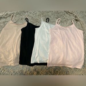 4 tank tops size 7/8 for girls in multiple colors.